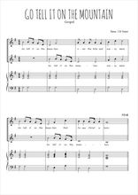 Téléchargez l'arrangement de la partition de Go tell it on the mountain en PDF pour deux voix égales et piano